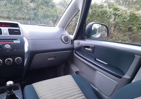 Suzuki SX4 cena 29900 przebieg: 150000, rok produkcji 2009 z Racibórz małe 121